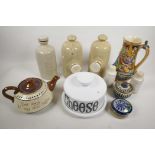 A box of stoneware pottery including Motsware teapot, hot water bottle, cheese dish etc