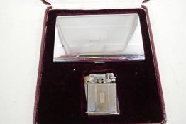 An Abdulla two piece cigarette lighter and case in presentation box