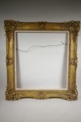 A good carved picture frame, with pierced scroll decoration, C20th, rebate 23½" x 21½"