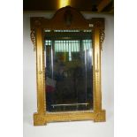 A gilt pier glass wall mirror with pierced decoration