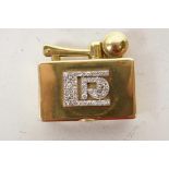 An Art Deco 18ct gold pocket lighter by S.A.M., Paris, France, design patented in 1926 by Strauss,