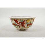A Chinese Ming style polychrome porcelain rice bowl decorated with carp in a lotus pond, 6 character