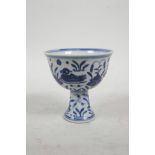 A Chinese Ming style blue and white porcelain stem cup decorated with waterfowl in a lotus pond, 6