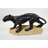 A well cast composition model of a Jaguar, resembling bronze, 10" long x 5½" high