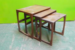 A G-Plan Fresco nest of three occasional tables, 21" x 17" x 19"