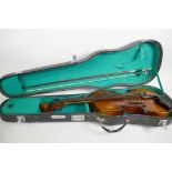 A violin, 23" long, together with a P&H London bow in a fitted case