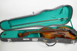 A violin, 23" long, together with a P&H London bow in a fitted case