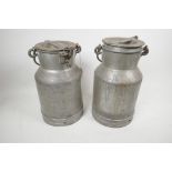 A pair of vintage galvanised metal one gallon milk/cream churns, 12" high