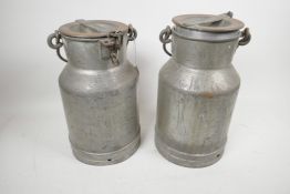 A pair of vintage galvanised metal one gallon milk/cream churns, 12" high