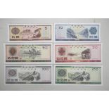 A quantity of Chinese facsimile (replica) foreign exchange certificates of assorted denominations,
