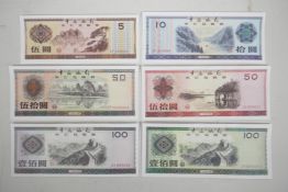 A quantity of Chinese facsimile (replica) foreign exchange certificates of assorted denominations,