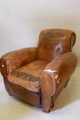 A 1920s leather easy chair, A/F