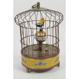 A singing bird in a cage automaton clock, 7½" high