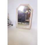 An arch top wall mirror with painted double acanthus leaf rope moulded frame, 33½" x 22"
