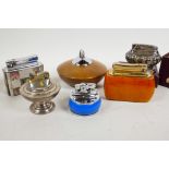 A collection of table lighters including Colibri with butterscotch Catalan base, Rolstar, Evans with