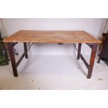 An antique pine trestle table with plank top, 60" x 32" x 30"