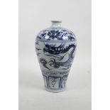 A Chinese Ming style blue and white porcelain meiping vase decorated with a dragon chasing the