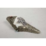 A Tibetan white metal mounted conch shell, 5½" long