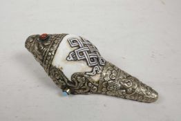 A Tibetan white metal mounted conch shell, 5½" long