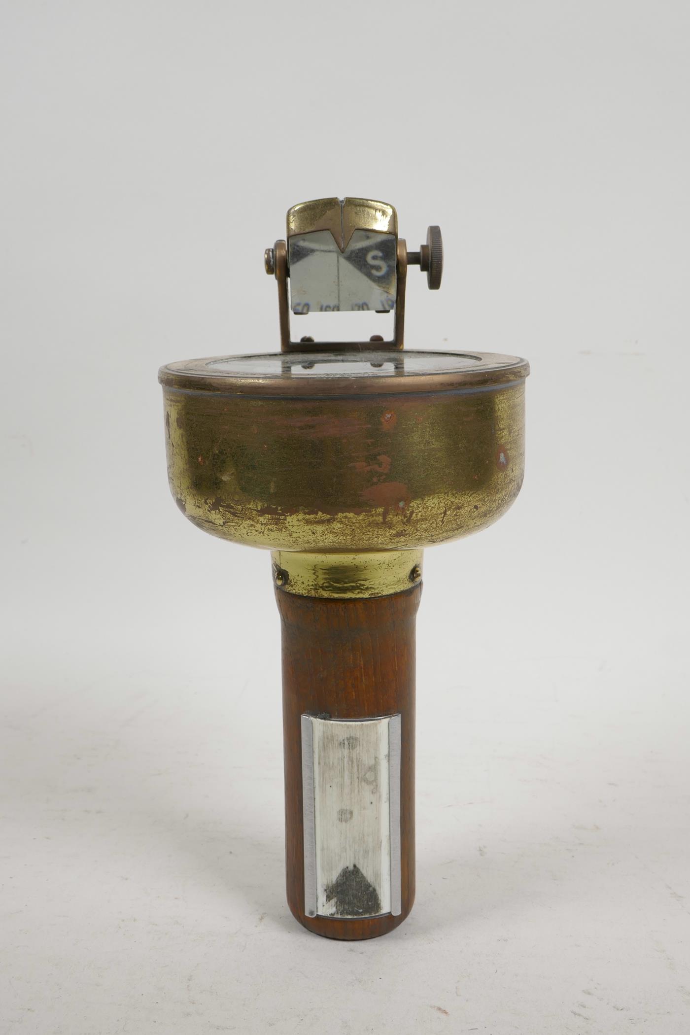 A 'Henry Browne & Son Ltd' brass and wood handheld 'Sestrel' compass, no.9833/13, 9" high, 4" - Image 2 of 4