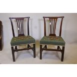 A pair of Georgian wide seat mahogany dining chairs, with pierced splat backs and handcrafted