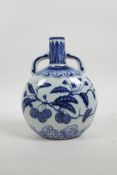 A Chinese blue and white porcelain two handled moon flask decorated with branches bearing fruit, 4