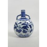 A Chinese blue and white porcelain two handled moon flask decorated with branches bearing fruit, 4