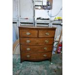 A Regency figured mahogany bowfront chest of two over three drawers, with brass oval plate