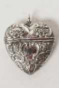A heart shaped white metal vesta case, 1¾" long