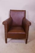 A child's leather club chair, 24½" high