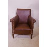 A child's leather club chair, 24½" high