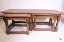 A nest of three oak occasional tables, 46" x 18" x 16"