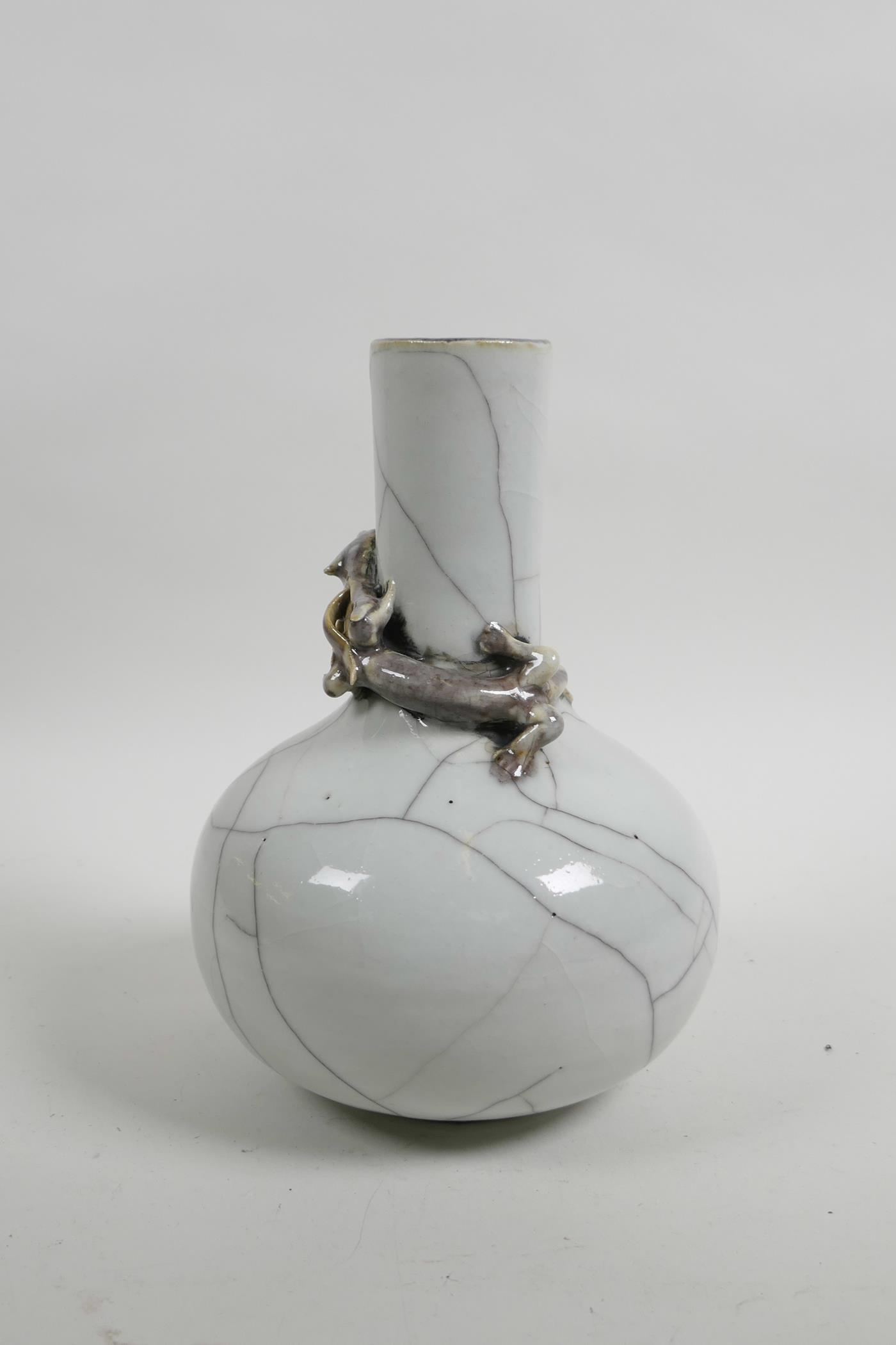 A Chinese crackle glazed pottery bottle vase decorated with a climbing dragon to the neck, 7½" high - Image 2 of 4