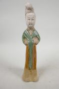 A Chinese Tang dynasty (618-907AD) terracotta figure of a court lady, Sancai glazed in original