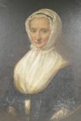 Portrait of a young lady in Puritan costume, C19th, oil on canvas, in a good C18th carved wooden