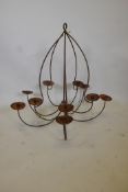 A ten branch wrought iron chandelier, 33" drop, A/F