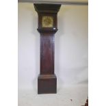 An C18th oak long case clock, the brass dial with engraved decoration of a sailing ship off a