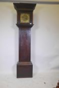 An C18th oak long case clock, the brass dial with engraved decoration of a sailing ship off a
