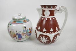 A C19th Adams Jasperware milk jug decorated with garlands and flowers on a deep red ground, 7½"