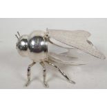 A silver plate and glass honey pot in the form of a bee, 6" long