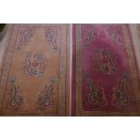 A Chinese deep pile wool rug with dragon pattern, 36" x 60", and another similar, along with a red