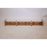 An Arts and Crafts brass and copper fire fender, 56" x 10"