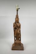 A Chinese lacquered plaster lamp base in the form of Quan Yin, 25" high
