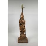 A Chinese lacquered plaster lamp base in the form of Quan Yin, 25" high