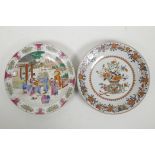 A Canton famille rose porcelain cabinet plate decorated with figures in a garden with chickens,