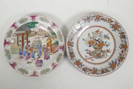 A Canton famille rose porcelain cabinet plate decorated with figures in a garden with chickens,