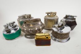 A collection of table lighters including a Ronson in silver base, A Polo, a Monopol, Ronson Crown