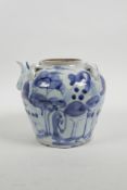 A Chinese blue and white porcelain pourer/pot with four lug handles and decorated with a stylised