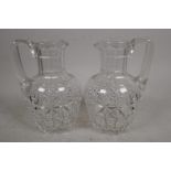 A pair of C19th cut glass jugs, 6½" high