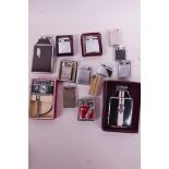 A selection of lighters including a mint in box Camera Lite, two Ronson Mastercases, a Beattie Jet